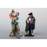 Two Royal Doulton figurines; The Beggar's Opera HN 526X, 17 cm high and The Puppet Maker HN 2253,