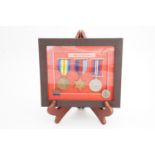 Framed Victory and other medals and badges Framed British War and Victory medals of J41898 W A J