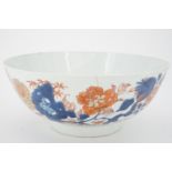 An 18th Century Chinese export punch bowl, (a/f - old stapled repairs), 29 cm