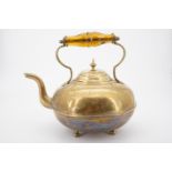 A Victorian brass tea pot, 23 cm