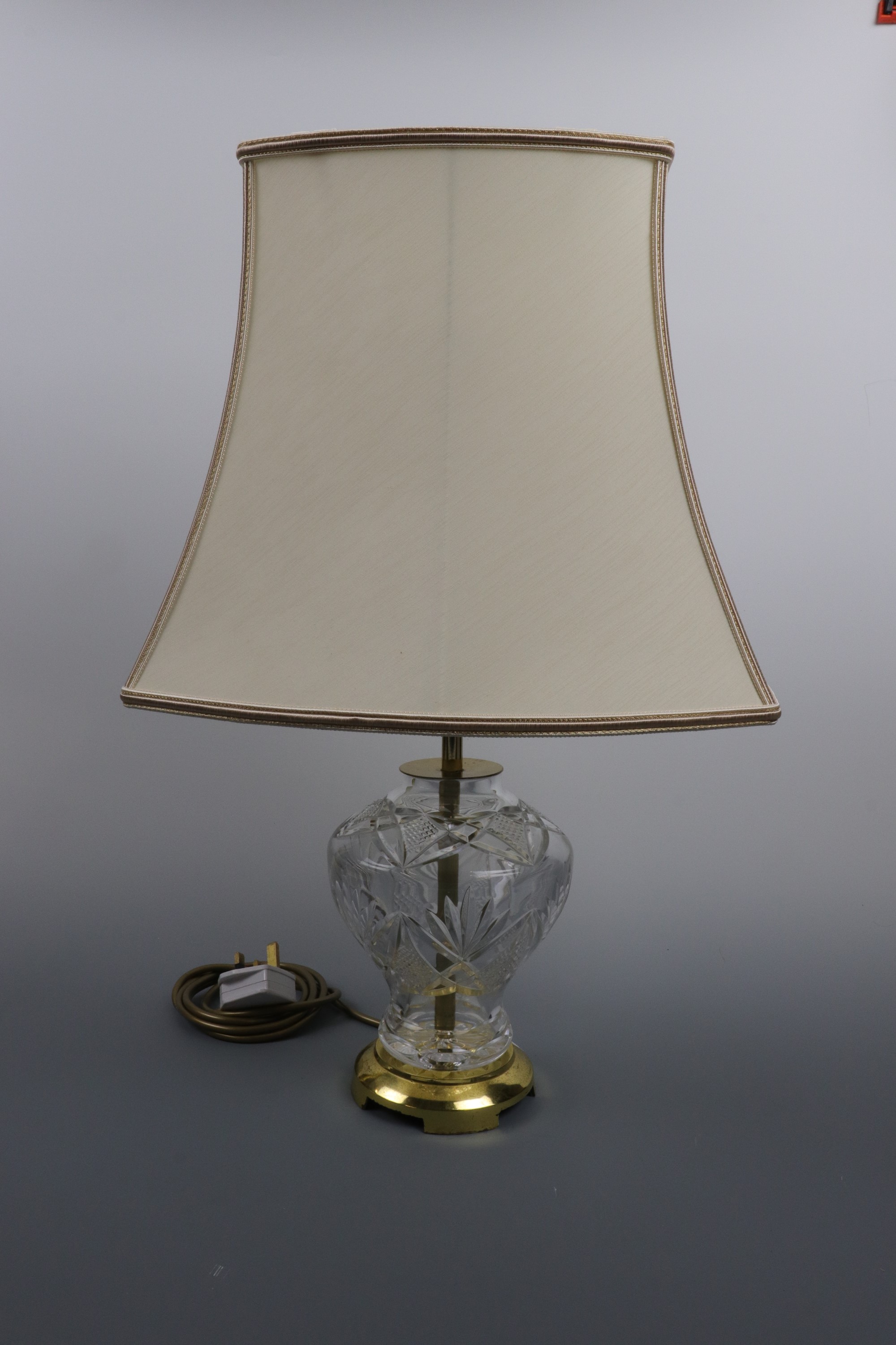 A glass table lamp and shade, 57 cm high
