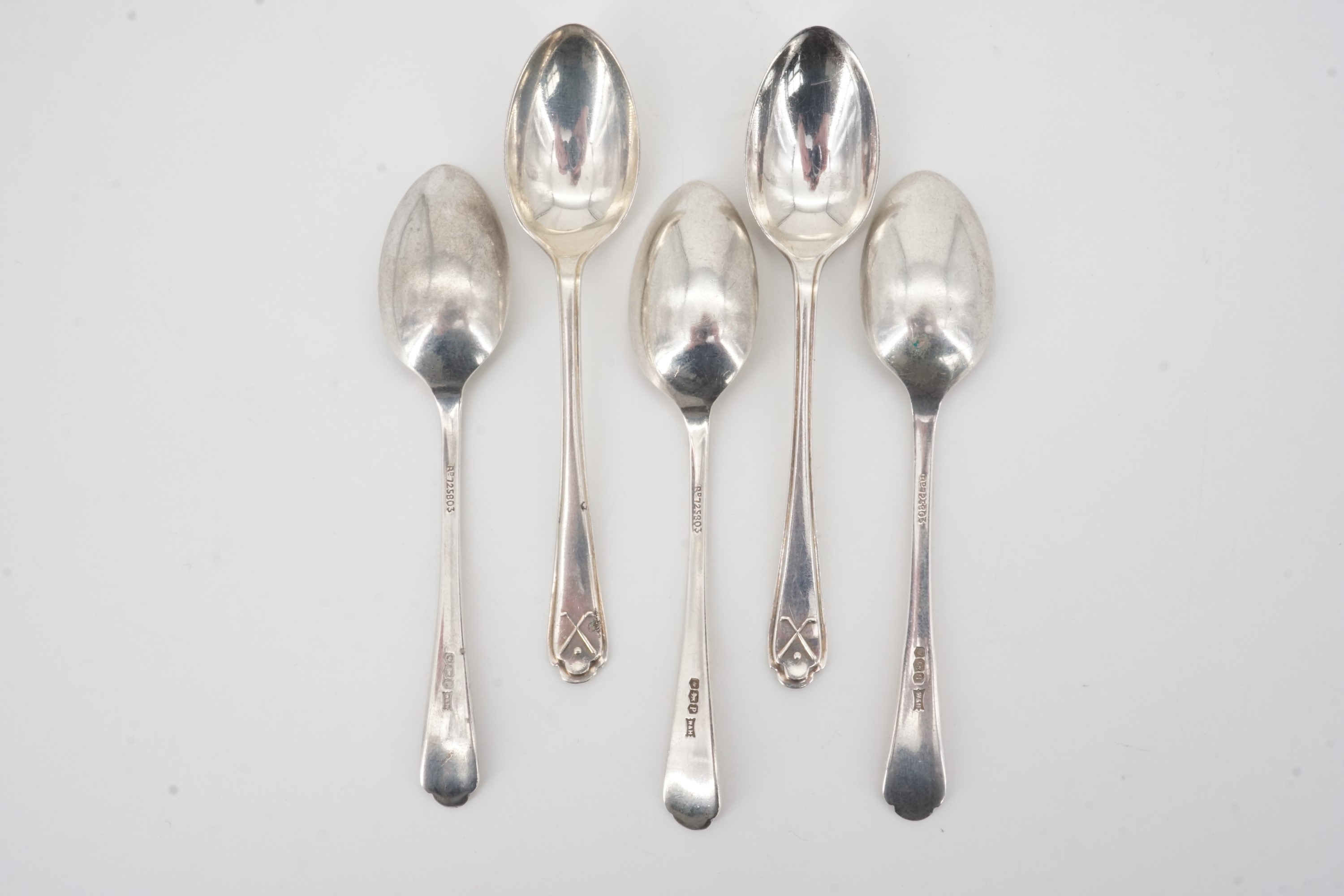 Five 1930s silver coffee spoons, their terminals faced with a crossed golf club and ball device, - Image 2 of 2