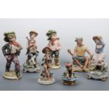 Five Capo-Di-Monte figurines and two other figurines, tallest 27 cm high