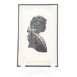 A mid-20th Century silhouette of a young girl with a ribbon in her hair, gouache with silver