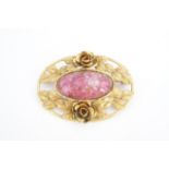 A Victorian oval floral brooch centred by a marbled pink aventurine glass oval cabochon, 6 cm x 4