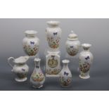 Five Aynsley Cottage Garden vases, tallest 23 cm, an Aynsley clock, a jug and a lidded jar