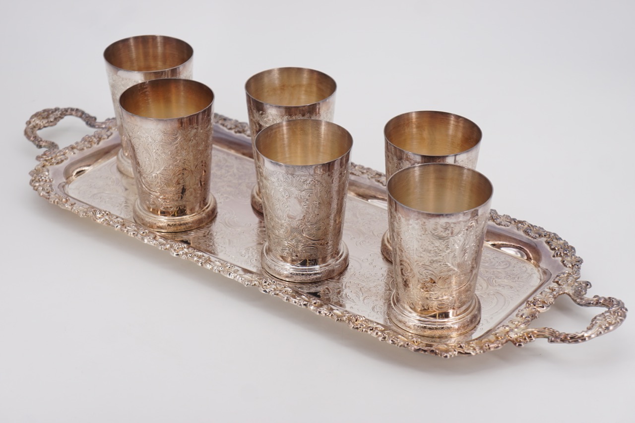 A Mappin and Webb electroplate tray together with six Mappin and Webb electroplate beakers