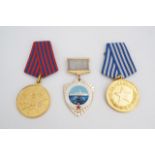 Soviet era Yugoslavian medals for bravery and national merit respectively, together with a Soviet