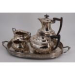 A Walker and Hall four-piece electroplate tea set together with an electroplate galleried tray