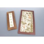 A framed pair of 19th Century Aesthetic ceramic tiles depicting bamboo and flowering gourd vines,