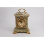 A Walt onyx mantle clock, 24 cm high