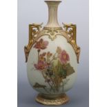 A Worcester blush ivory vase, of footed ovoid form with slender everted neck and a pair of square