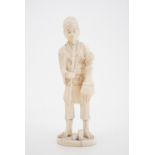 An early 20th Century Japanese ivory okimono depicting a fisherman with trident, 17.5 cm