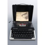 A vintage Silver Reed Leader II portable typewriter