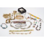 A quantity of costume jewellery bracelets and necklaces