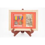 Framed British War and Victory medals to 51039 Pte Thomas Harry Chapman, Border Regiment, with