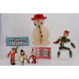 Vintage kitsch Christmas decorations, including a Paul Renoir 'Floral Creation' Elf on the Shelf
