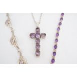 Two amethyst and white metal bracelets together with a similar pendant cross