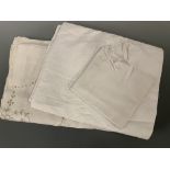An antique hand-embroidered linen bedspread, worked in natural brown cottons over white, 214 x 240
