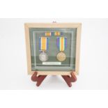 Framed British War and Victory medals to 133705 Pte John McIntosh, RFA