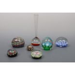 Two Murano glass paperweights and five others