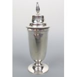An Edward VIII silver caster of Modernist / Art Deco influence, of elongated ovoid form with