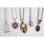 A number of contemporary white metal mounted mineral and shell pendant necklaces including a Blue