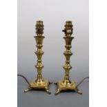 A pair of brass candlestick-form table lamps, 20th Century, 26 cm including sockets