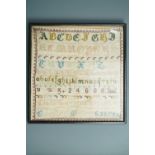 A Victorian alphabet needlework sampler worked by Clare Congers Wright [?] October 6 1879, in wool