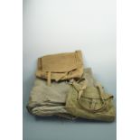 A military sleeping bag and two webbing haversacks