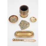 Victorian brassware including an ink well, paper knife, pen tray, bowl, a small dish bearing the
