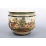 A Royal Doulton footed cachepot, decorated in the round with a country village scene, 22 cm