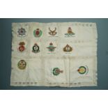 A set of Second World War dining table fabric place mats bearing embroidered military badges