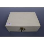 A vintage jewellery box containing a small quantity of costume jewellery including a Marks and