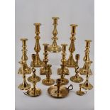 A quantity of Victorian brass candlesticks etc., tallest 31 cm