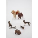 A group of antique cold painted bronze and other base metal dogs, together with a rabbit and a