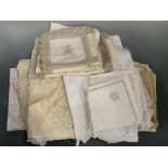 A quantity of antique whitework table linens