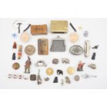 Sundry small collectors' items including a die-cast Coronation coach, charms, an ANZAC button etc
