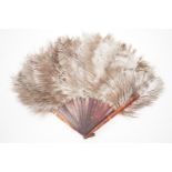 A 1920s faux tortoiseshell and ostrich feather fan, 35 cm