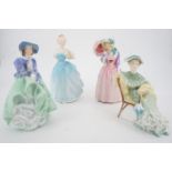 Four Royal Doulton figurines; Ascot HN 2356, Miss Demure HN 1402, Enchantment HN 2178 and Top o' the