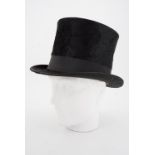 A gentleman's antique black silk top hat retailed by David Mackie & Co of Newcastle, inside