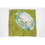 A vintage Liberty of London silk scarf depicting 19th Century sporting scenes, reserved over a green