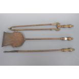 A set of 19th Century brass fire implements