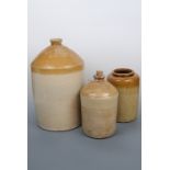 A Little and Hope Wine and Spirit Merchants of Carlisle stoneware flagon, 45 cm, and one further