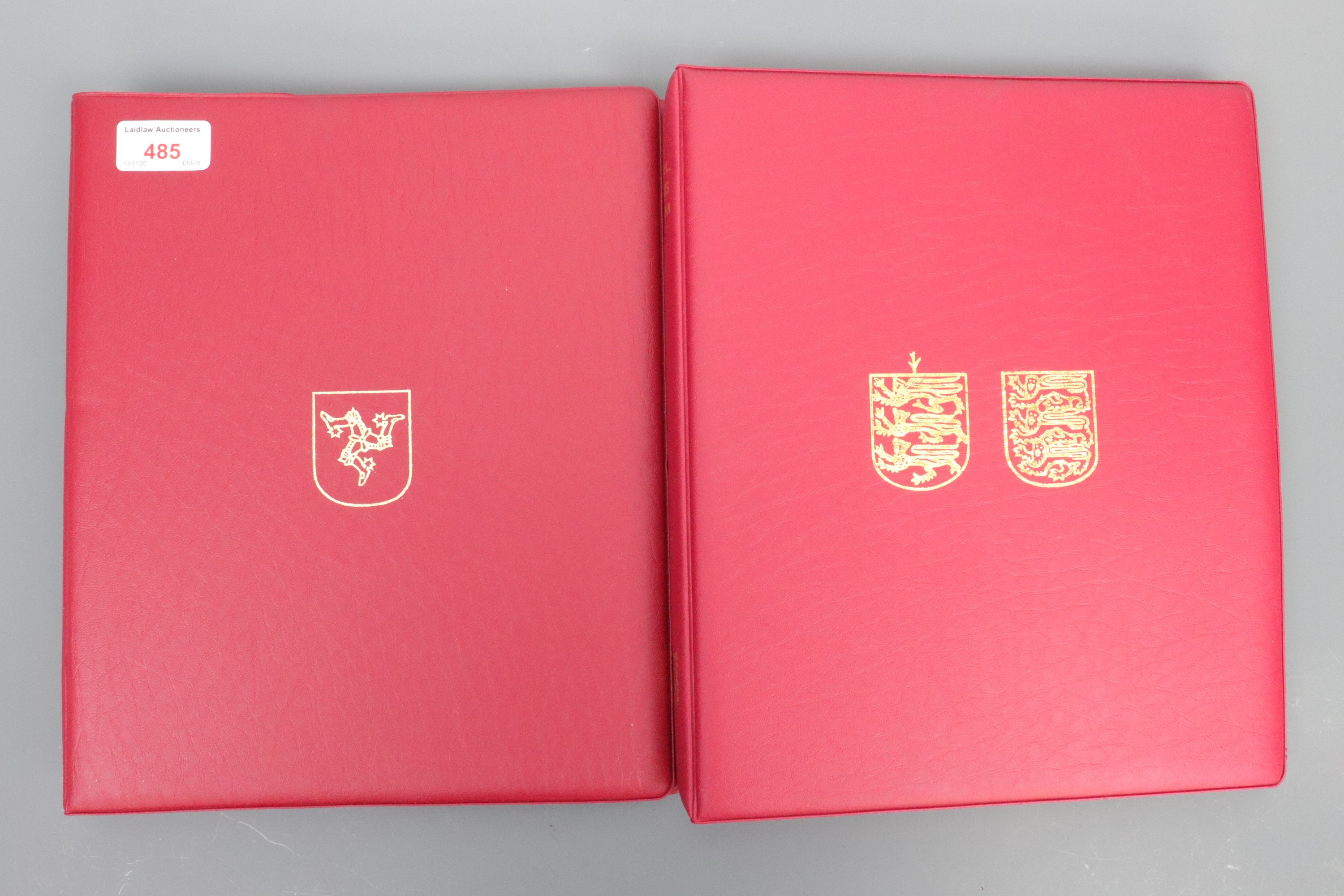 Two Stanley Gibbons Channel Islands / Isle of Man stamp albums and stamps