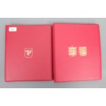 Two Stanley Gibbons Channel Islands / Isle of Man stamp albums and stamps