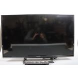 A Panasonic TV model No TX-32E5500B with remote control