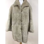 A D H Evans of Oxford vintage fur swing coat, with rolled collar and bracelet length sleeves,