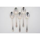 Five 1930s silver coffee spoons, their terminals faced with a crossed golf club and ball device,