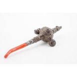 A 19th Century child's white metal and coral combines soother, rattle and whistle, 12 cm